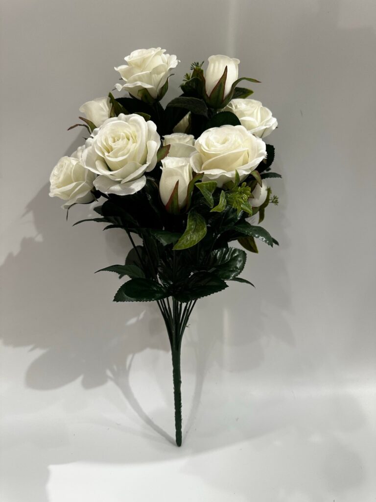 Decorate your home with this rose bush. Place it in a vase to display on your coffee table or fireplace mantel for a lovely touch.RoseWhiteDull Satin17" (43.18 cm)12 stems pe