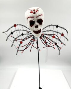 18IN JEWEL SKULL RED EYES SPR